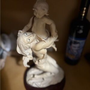 Graceful Ivory Mother and Child Sculpture